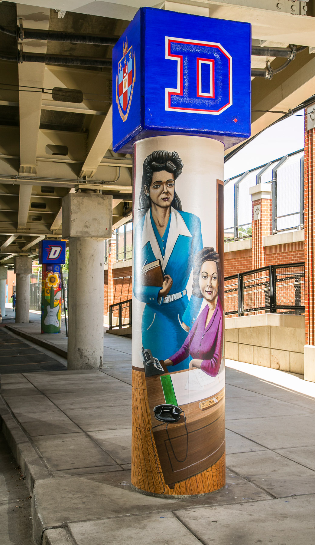A pillar featuring Rose Vaughn and Marion Amoureux, the university's first African-American women to graduate, is now part of the collection that are part of "The Story of the Little School Under the 'L'" public art project. (DePaul University/Jamie Moncrief)